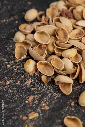 empty shells from salted pistachio nuts on the table