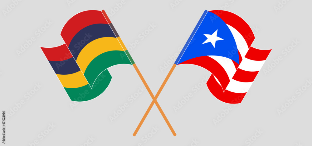 Crossed and waving flags of Mauritius and Puerto Rico