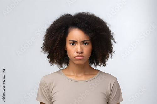 Young adult African American woman, head and shoulders portrait on white background. Neural network generated photorealistic image. Not based on any actual person or scene. photo