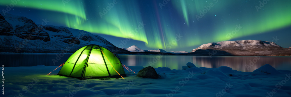 A camping tent glowing under the northern lights, Aurora Borealis. Travel and adventure