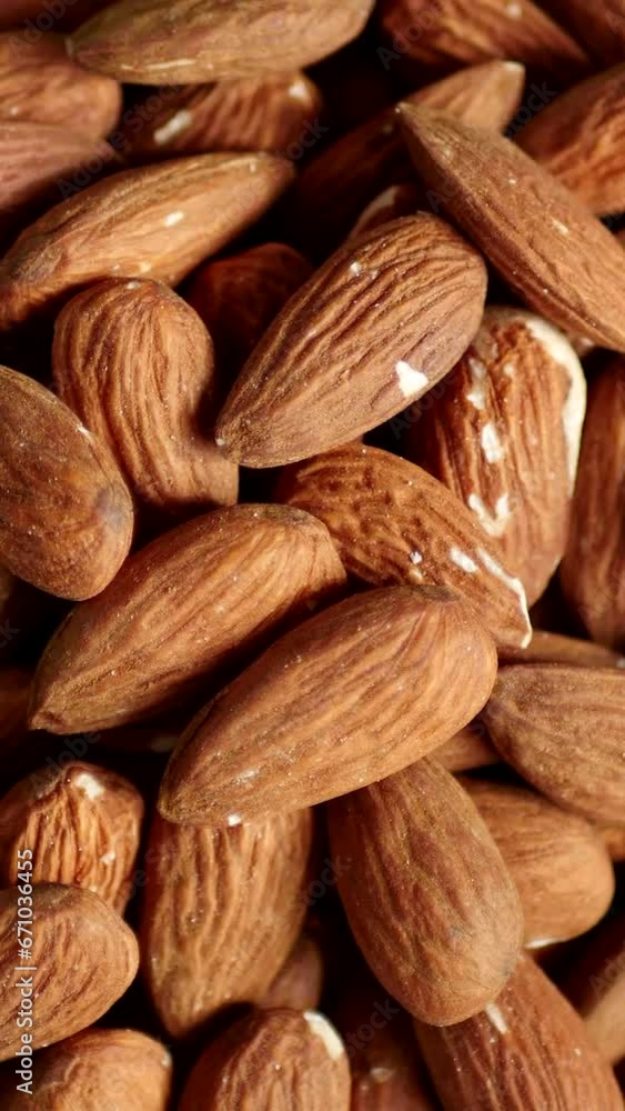 Almond texture. Nut background. Vegan diet. Vertical video