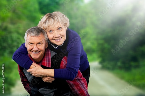Portrait of a beautiful old couple in the park. © BillionPhotos.com