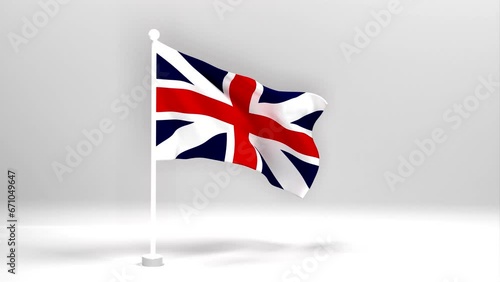 An United Kingdom flag flutters against a black background from a stream of vert. Beautiful Great Britain flag on a white flagpole.