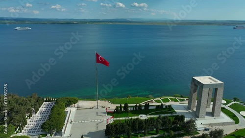 Martyrs Monument Canakkale. Turkish flag. Red Turkish flag waving on the sea. Drone Shoot photo