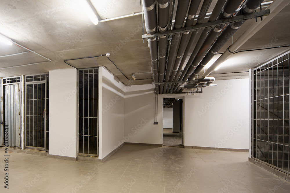 The basement of a residential complex. Storage rooms, for storing things