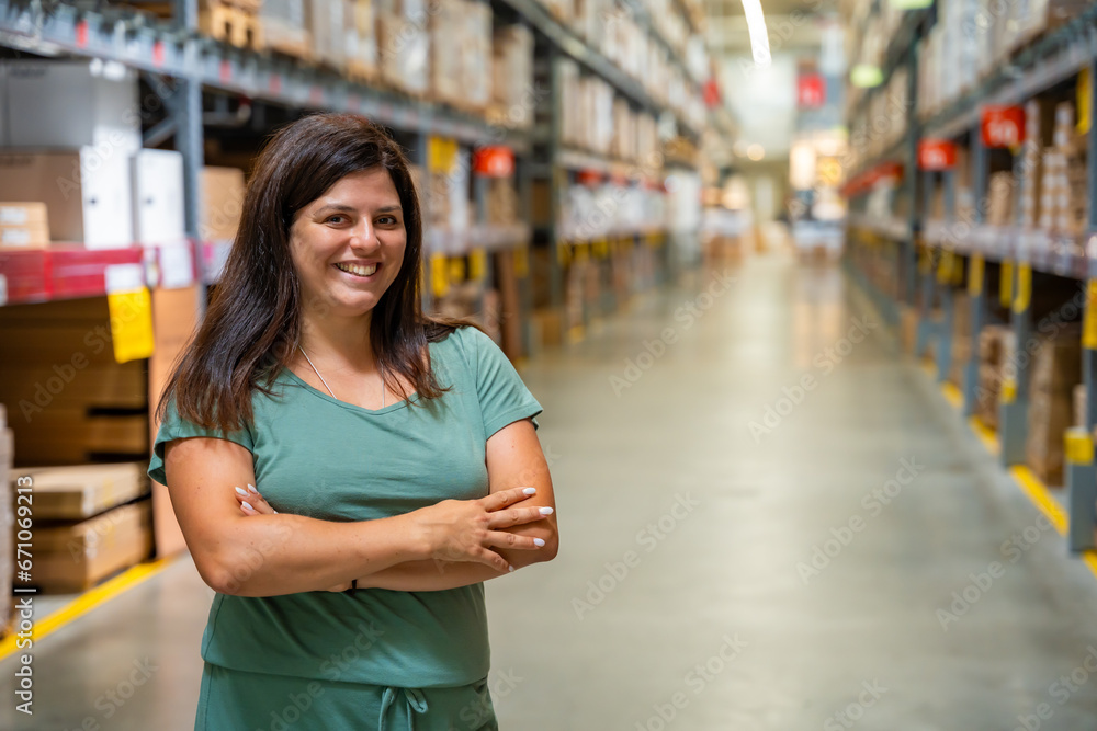 Portrait of woman customer or store worker with shelves in storage as background