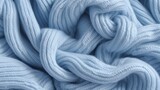  a close up view of a blue yarn textured with yarn.  generative ai