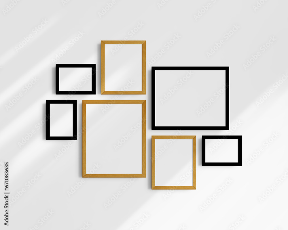 Gallery wall mockup set, 7 black and yellow oak frames. Modern frame mockup. Horizontal, vertical frames, 5x7 (5:7), 7x5 (7:5), 8x10 (4:5), 12x15 (4:5), 15x12 (5:4) inches. White wall with shadows. Gallery wall mockup set, 7 black and yellow oak frames. Modern frame mockup. Horizontal, vertical frames, 5x7 (5:7), 7x5 (7:5), 8x10 (4:5), 12x15 (4:5), 15x12 (5:4) inches. White wall with shadows.