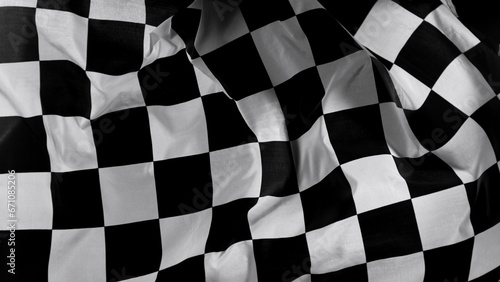Checkered Race Flag. Freeze Motion Wavy closeup fabric fluttering Racing Flags background. Formula One flag car motor sport. photo