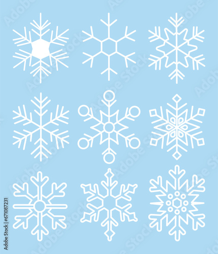 Set of white snowflakes on a blue background. Simple vector illustration. Stickers.