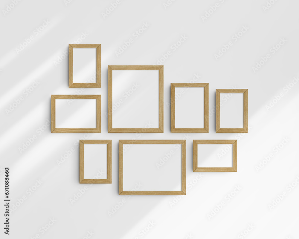 Gallery wall mockup, 8 timber oak wood frames. Modern frame mockup. Horizontal, vertical frames, 4x6 (2:3), 6x4 (3:2), 5x7 (5:7), 7x5 (7:5), 8x10 (4:5), 10x8 (5:4) inches. White wall with shadows. Gallery wall mockup, 8 timber oak wood frames. Modern frame mockup. Horizontal, vertical frames, 4x6 (2:3), 6x4 (3:2), 5x7 (5:7), 7x5 (7:5), 8x10 (4:5), 10x8 (5:4) inches. White wall with shadows.