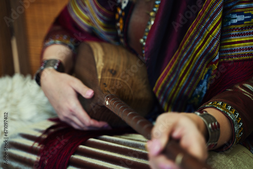 Turkmen Folklore woman playing dutar