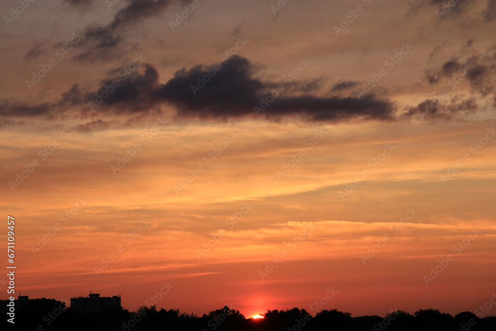 Colorful cloudy sky at sunrise as natural background