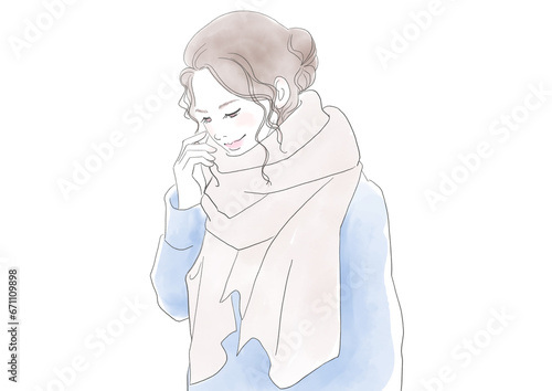マフラーをした笑顔の女性