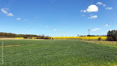 Beautiful spring landscape of fields and meadows in the Polish countryside