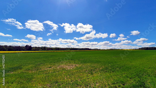 Beautiful spring landscape of fields and meadows in the Polish countryside