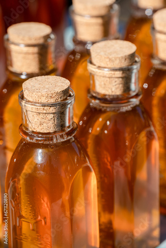 honey bottles with corks at a local farmers market