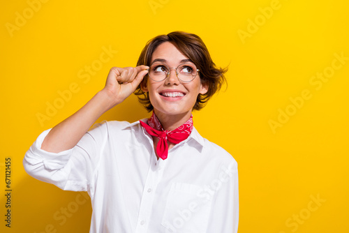 Photo of young girl touch specs elegant wear red kerchief look interested novelty ophthalmology ad isolated on yellow color background