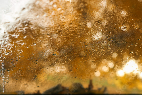 Car window with raindrops  autumn wallpaper