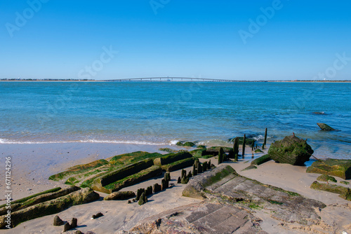 Longport coast scene with Ocean City-Longport Bridge connect Ocean City and Egg Harbor across Great Egg Harbor Bay, New Jersey NJ, USA. This bridge is part of the Ocean Drive in New Jersey. photo