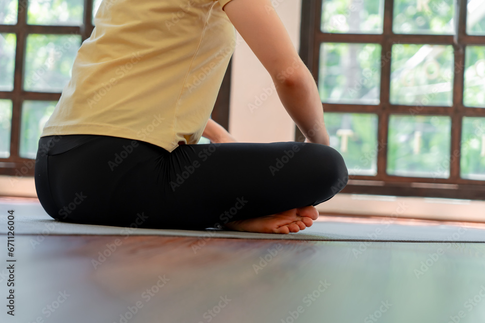 Female girl Attractive young asian woman doing stretching exercise on mat yoga Calmness and relax at gym Full body concentrated flexibility during workout Female girl Attractive young asian woman doing stretching exercise on mat yoga Calmness and relax at gym Full body concentrated flexibility during workout
