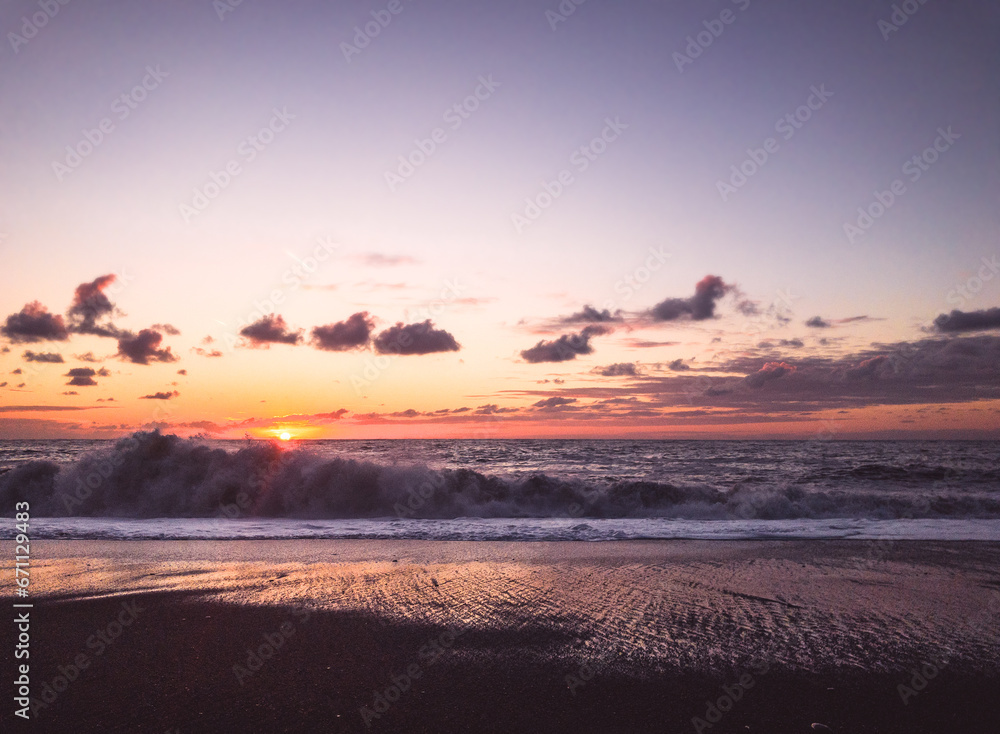 stormy sea beach at sunset