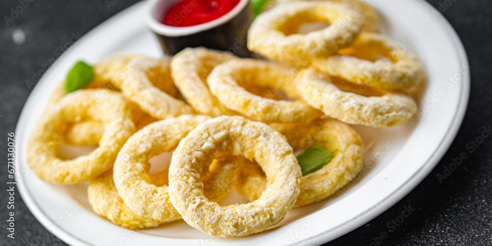 onion rings deep fryer tomato sauce fast food eating cooking meal food snack on the table copy space food background rustic top view onion rings deep fryer tomato sauce fast food eating cooking meal food snack on the table copy space food background rustic top view