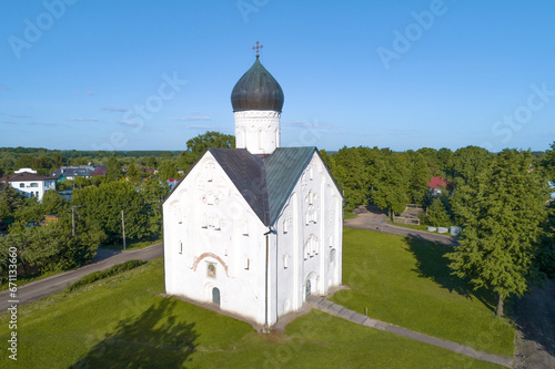 Medieval Church of the Transfiguration on Ilyina Street (1374) on a sunny June day. Shooting from a quadcopter. Veliky Novgorod, Russia photo