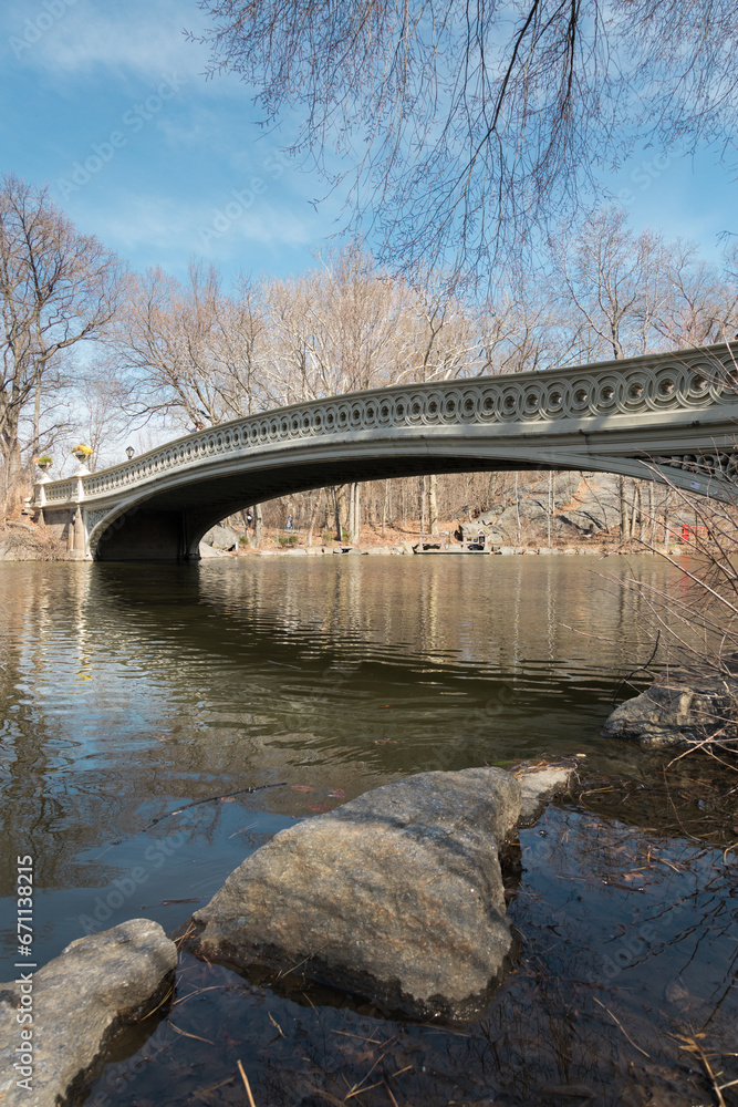 On a clear, sunny winter morning at the Bow Bridge in Central Park, Manhattan, New York On a clear, sunny winter morning at the Bow Bridge in Central Park, Manhattan, New York