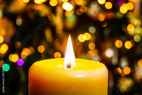 burning candles on a christmas background