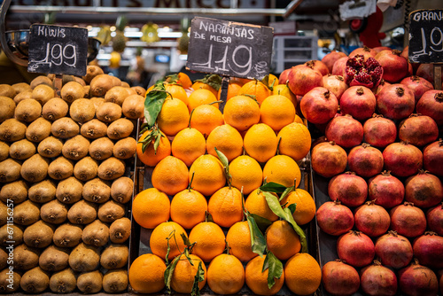 Close up, top view. Different multicolor fruits on the counter at a Spanish bazaar.