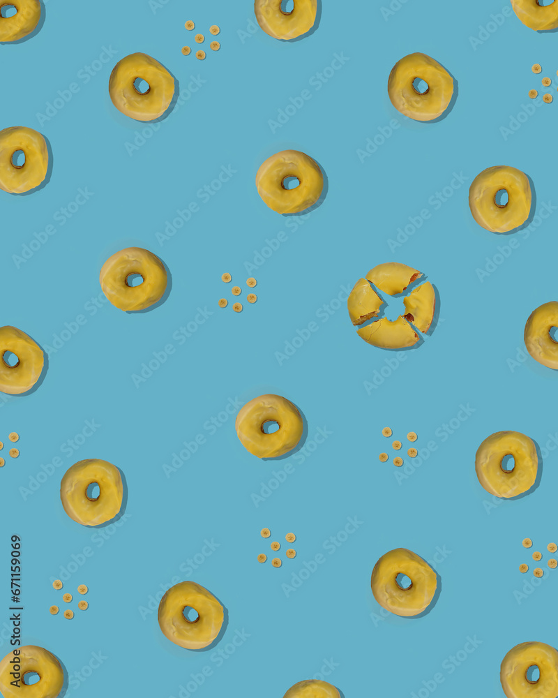 pattern of yellow donut and banana rings on a blue background, pattern of yellow donut and banana rings on a blue background,