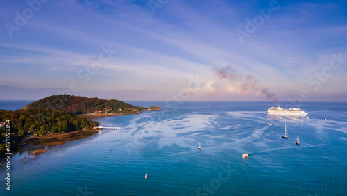 Phuket, Thailand, Patong Bay, Panoramic Nature Views from a Drone Camera Aerial view of Patong town in Phuket, Thailand. The sea is beautiful in the summer, the sun is shining, the morning is 
