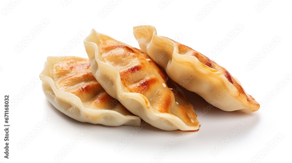 A couple of dumplings sitting on top of each other, tasty dim sum. A couple of dumplings sitting on top of each other, tasty dim sum.