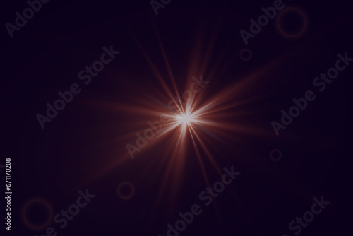 Fototapeta Naklejka Na Ścianę i Meble -  Golden bright star. Light effect bright explosion. A flash of light and glare. Light on a black background.