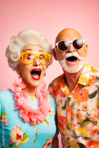 Older couple with sunglasses and flowered shirt.