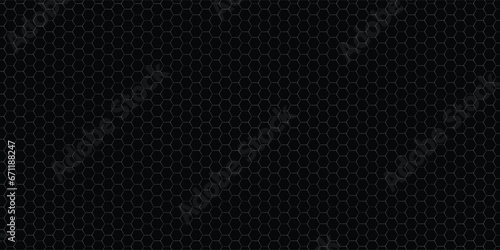 Dark gray abstract wide horizontal banner with hexagon carbon fiber grid and orange luminous lines. Technology vector background with orange neon lines photo