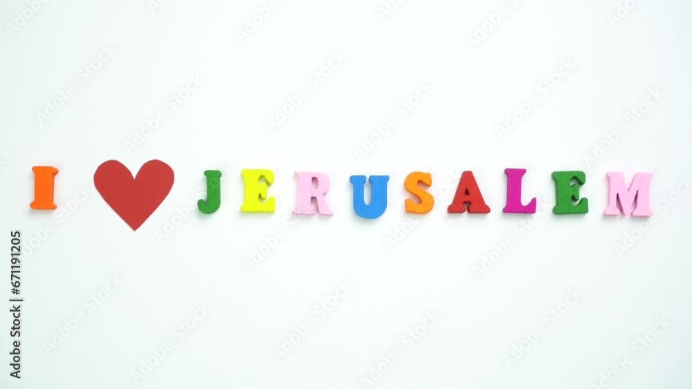 I Love Jerusalem text from colorful wooden letters and a beating paper red heart. I Love Jerusalem text from colorful wooden letters and a beating paper red heart.