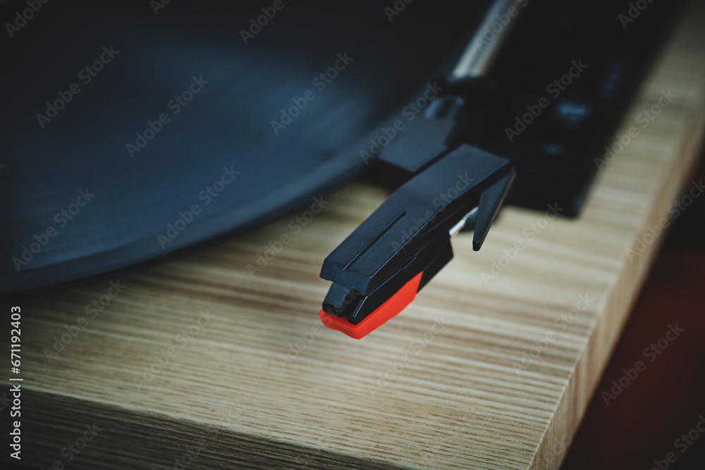 Classic vinyl record player closeup. Retro style. Classic vinyl record player closeup. Retro style.