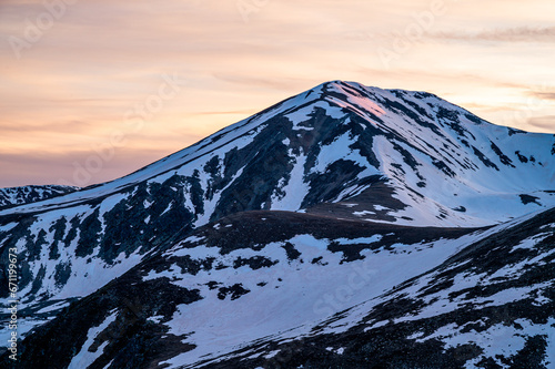 Mountain in winter at sunset