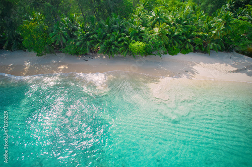  Drone bird eye view at Anse solei beach, white sandy beach, turquoise and calm sea and trees, Mahe Seychelles 1