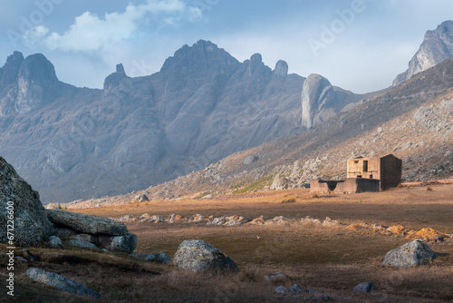 An abandoned and semi-destroyed house in the middle of nowhere in a vast Andean landscape above 3000 m above sea level horizontal photo