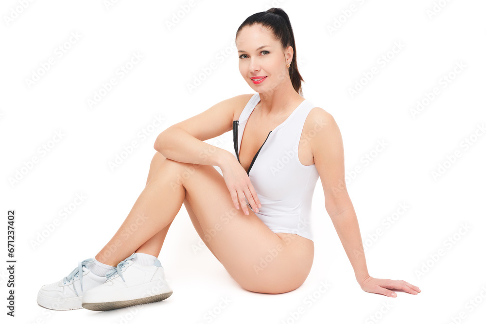 Slim sexy caucasian girl in a white bodysuit isolated on a white background. Slim sexy caucasian girl in a white bodysuit isolated on a white background.
