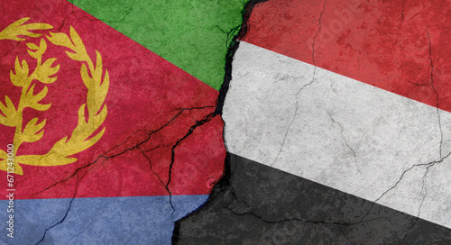 Eritrea and Yemen flags, concrete wall texture with cracks, grunge background, military conflict concept