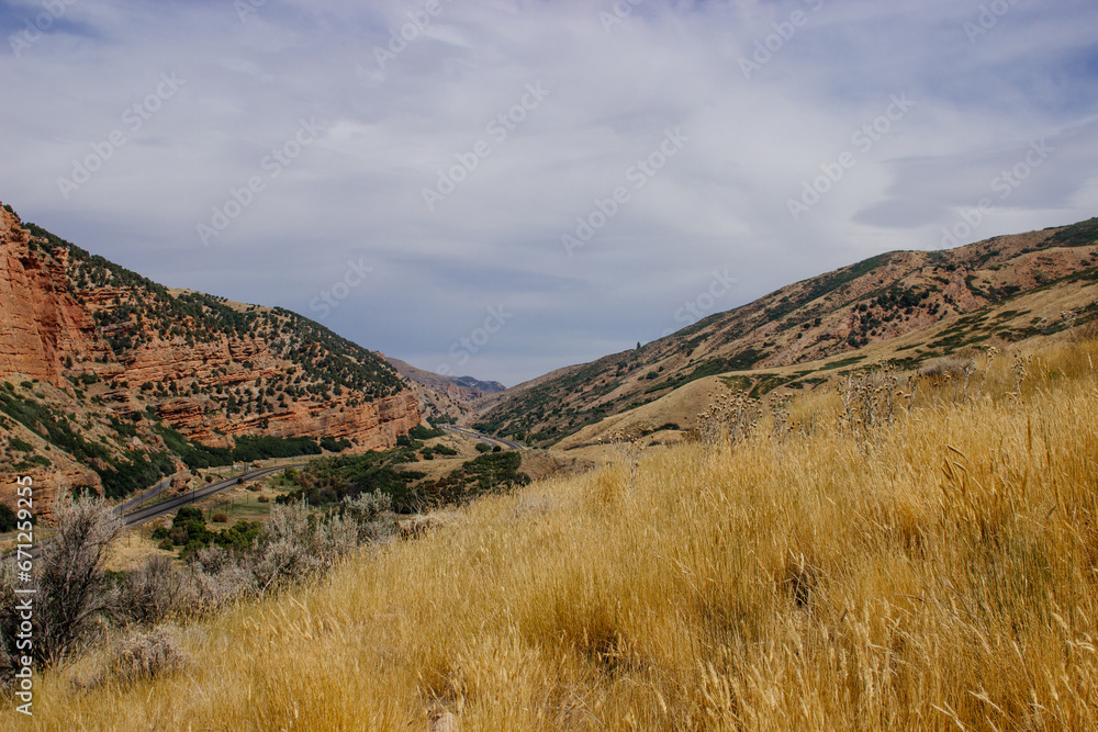 Red Canyons in the USA in fall. Beautiful landscape with red high mountains in autumn in orange and yellow tones. Echo Canyon, Utah, USA Red Canyons in the USA in fall. Beautiful landscape with red high mountains in autumn in orange and yellow tones. Echo Canyon, Utah, USA