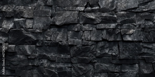 A black and white photo showcasing a textured rock wall. Suitable for various design projects and artistic compositions