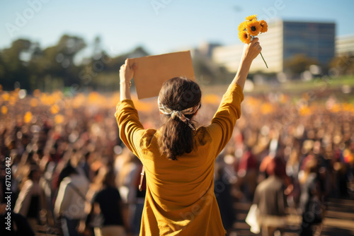 A person carrying an "End Poverty" sign during a demonstration, emphasizing the global fight against poverty and inequality. Concept of poverty eradication. Generative Ai.