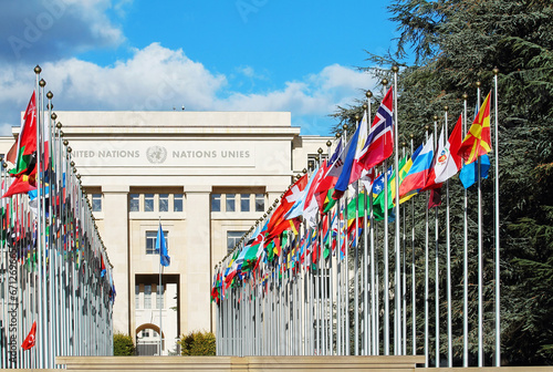 Flags in front United Nations Palais in Geneva Switzerland.