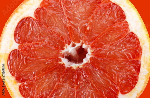 Juicy red grapefruit macro image. Macro red grapefruit texture background.