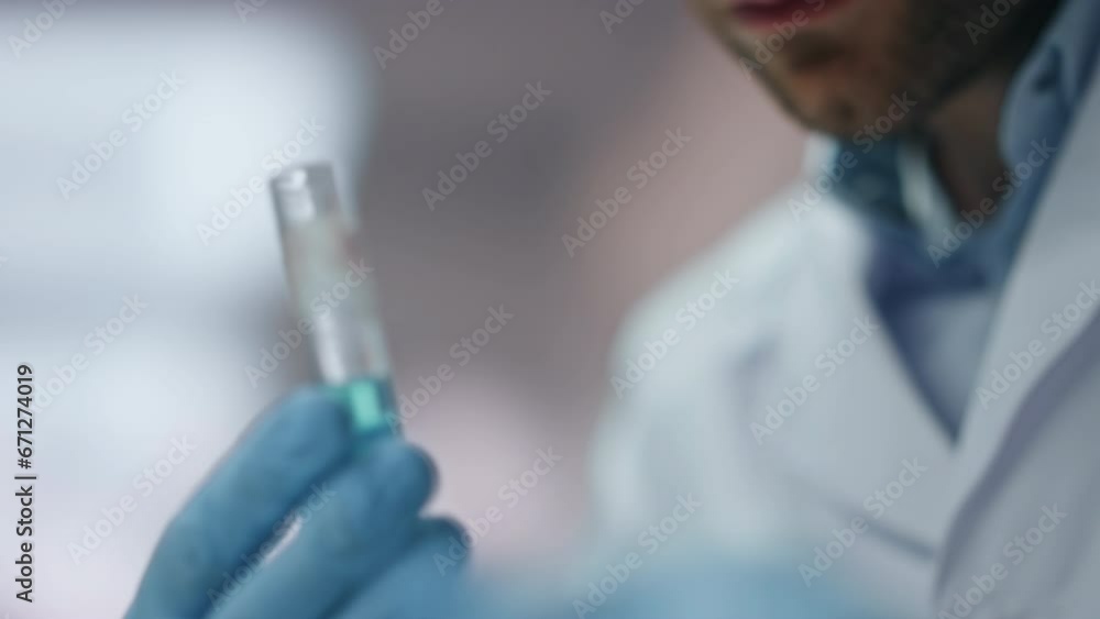 Doctor hands taking sample vaccine in test tube working laboratory close up. Doctor hands taking sample vaccine in test tube working laboratory close up.